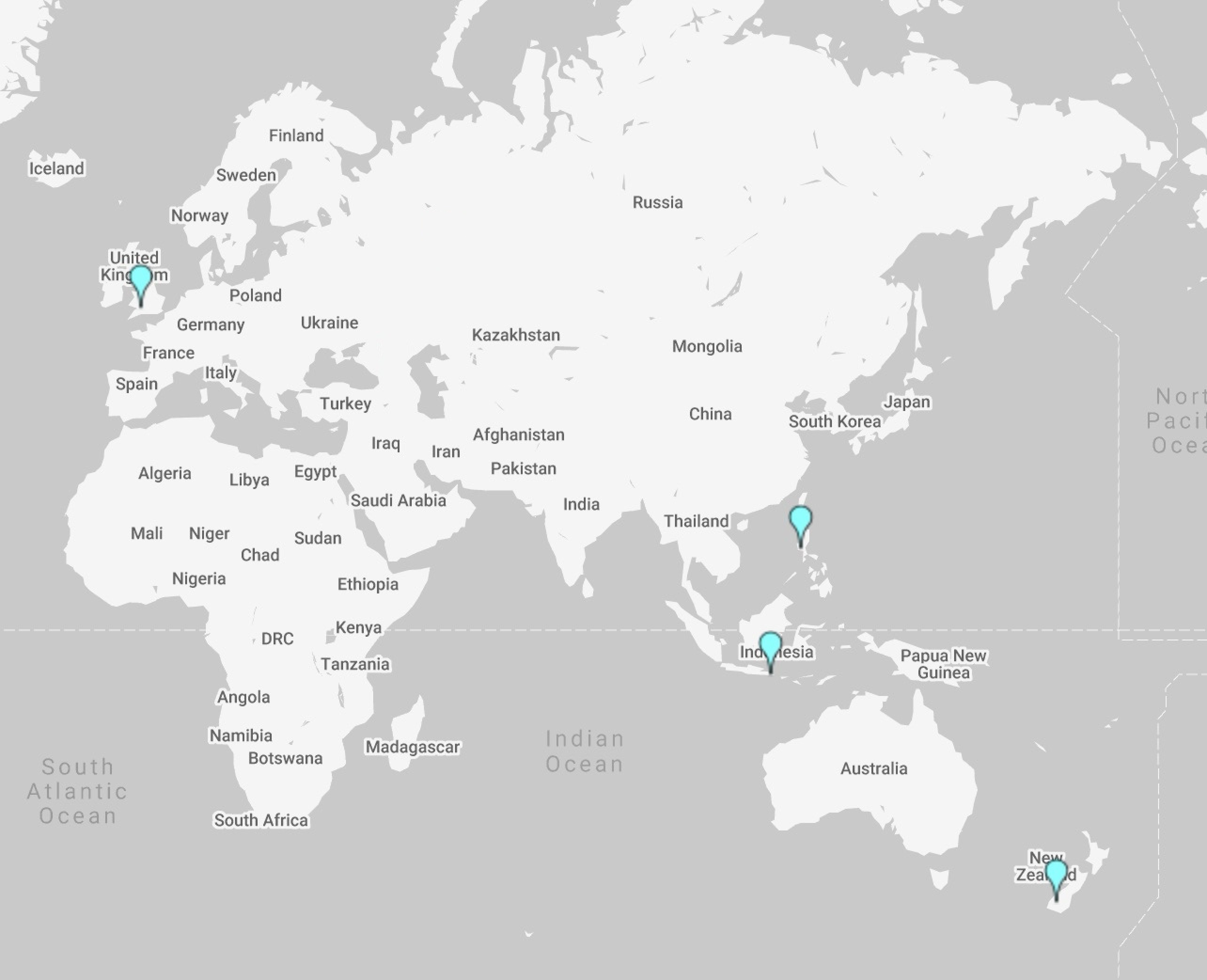 A map of the world with a pin for each team member.